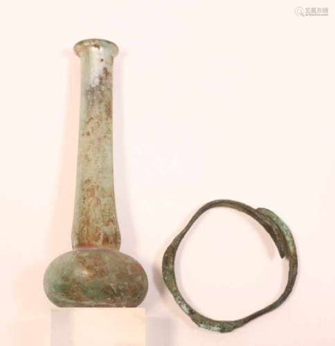 Roman, glass perfume bottle and bronze child bracelet, ca. 2nd century BC., [2]80
