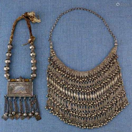 Oman, amulet necklace, 'Hirz', and Yemen, silver alloy bride necklace, 'Labba'with sixteen small