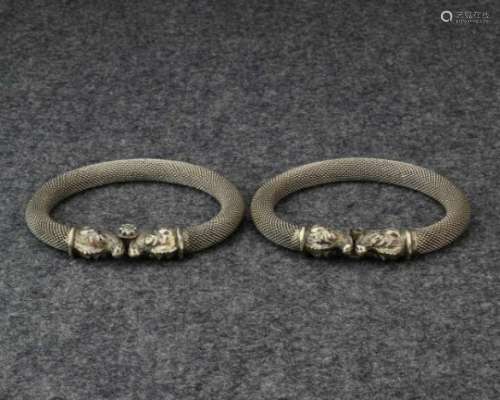 India, Rajasthan, pair of knitted-wire, flexible-tube bracelets, 'Bala'each with two Makara Heads.