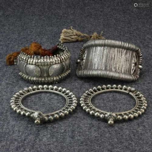 India, Rajasthan, a pair of silver bracelets, ‘Knatria’ or 'Bangri gokru’ and two flexible silver