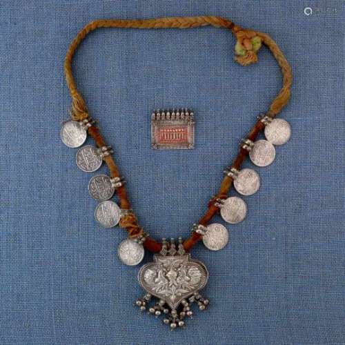 India, a.o. Rajasthan, Gujarat, silver amulet and silver necklacestamped amulet with red pigment and