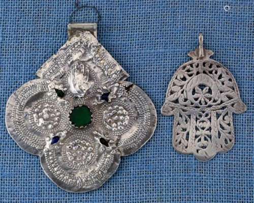 Morocco, Esseouira, two silver amulets hammered amulet with green and blue glass stones and the