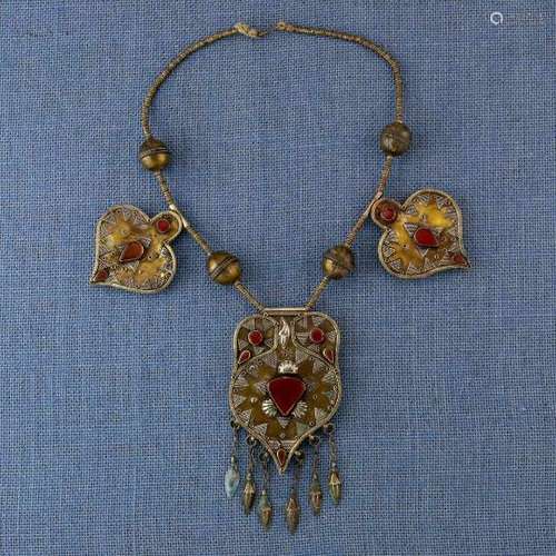 Turkmenistan, Teke, silver alloy necklace decorated with carnelian settings, chained amulets,