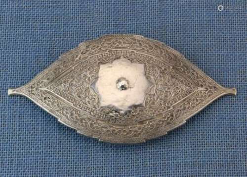 Indonesia, Sumatra, Minangkabau, silver alloy belt bucklewith floral relief , l. 18 cm and 100