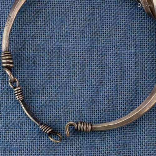 China, Miao, silver spiral neckring with engraved flower, diam. 16 cm and 420 grams. [1]250