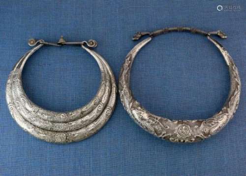 China, Guangxi, three-part hollow neck ring, Miao, hollow neck ringwith hammered decorations of a.o.