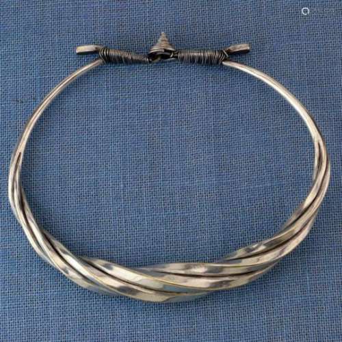 China, Miao, twisted neck ring with a spiral cone clasp, diam. 25 cm and 951 grams. [1]200
