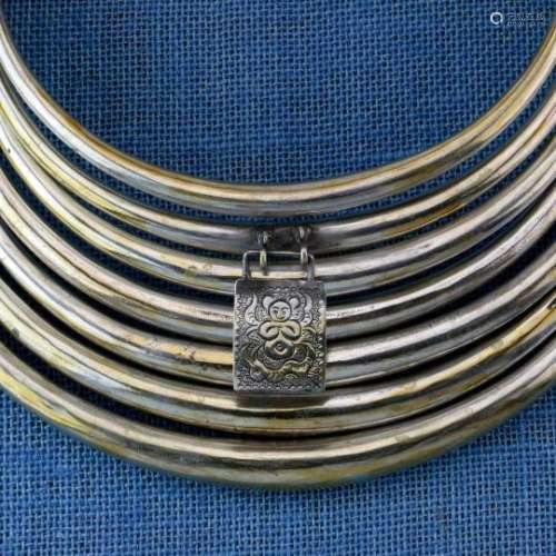 China, Miao_Dong, solid seven-parts neck ring, diam. 22 cm and 1850 grams. [1]200