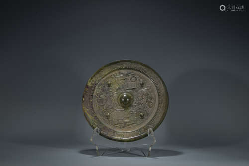 Qing dynasty bronze mirror with dragon pattern