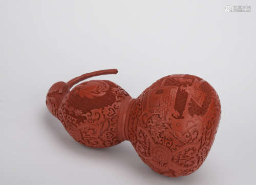 Qing dynasty carved lacquerware gourd ornament with landscape pattern