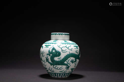 Qing dynasty green glaze jar with dragon pattern