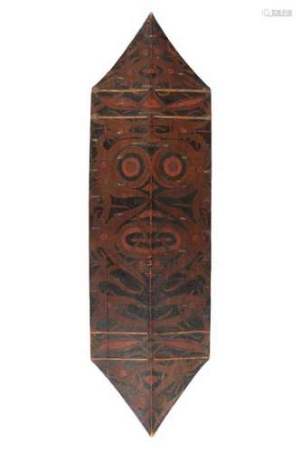 Borneo, Dayak, war shield, ca. 1900.With a painted central mythological figure and fine curved