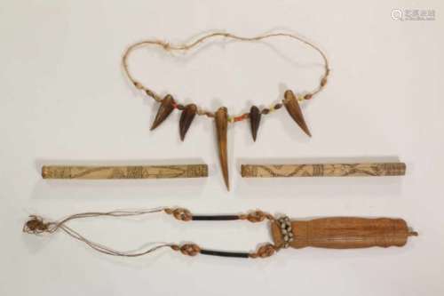 Highlands, Mek tribe, two bamboo earplugs, Asmat hunter amulet and necklacefrom the nails of a