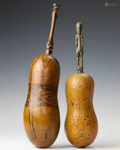 Papua, Sentani, two lime containers, two gourds with burned geometrical patterns and wooden lick