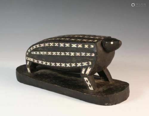 Solomon Islands, Malaita, highly decorative carved wooden animal figure, ca. 1950,with shell