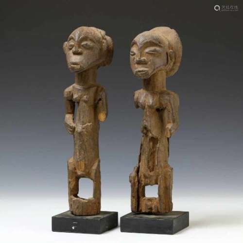 DRC., Luba, a pair of ancestral figureswith a grey to black patina and weathered expression. Private