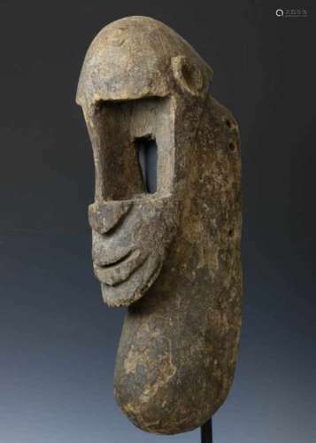 Mali, Dogon, goiter face mask, elongated mask with bulbous neck and encrusted patina. Private Berlin