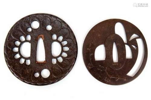 Japan, twee tsuba's, Edo periode,een ajour met in reliëf een bloesemtak, gesigneerd Choshi Hagirju