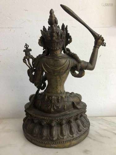 Tibet, bronzen sculptuur van Manjushri, ca. 1900,met zwaard, lotusbloem en uitgedost met juwelen.