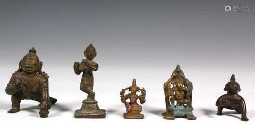 India, vijf bronzen sculpturen, w.b. 19e eeuw;o.a. twee Krishna als kind en twee kleine Ganesha