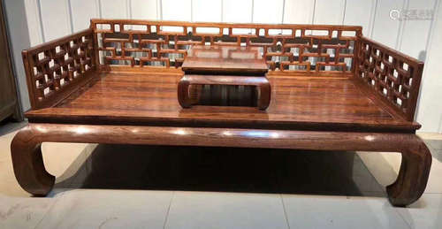 A HUANGHUA WOOD BED CARVED WITH PATTERN