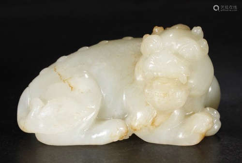 A HETIAN JADE LION PENDANT