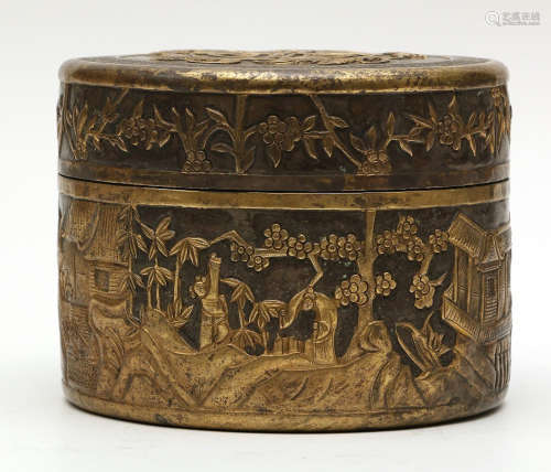 A GILT BRONZE BOX CARVED WITH STORY PATTERN