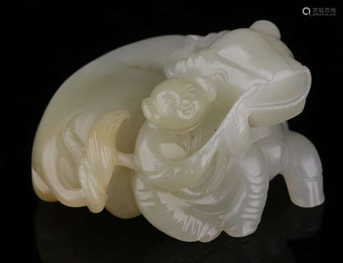 A HETIAN JADE CARVED FIGURE AND COW