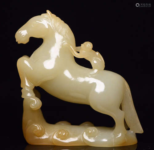 A HETIAN JADE CARVED FIGURE AND HORSE