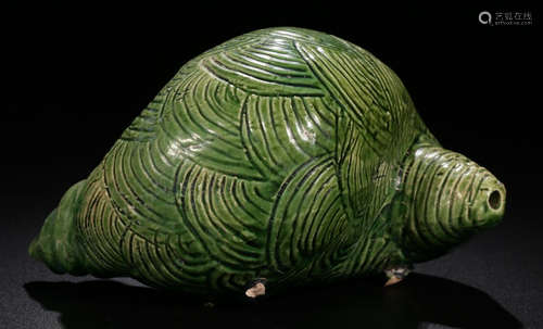 A GREEN GLAZE CONCH ORNAMENT