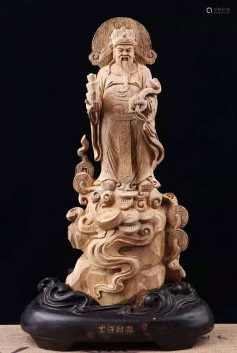 A CHENXIANG WOOD CARVED CAISHEN
