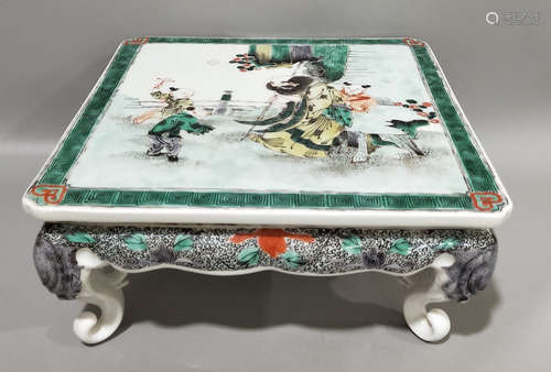 A FIVE COLOR GLAZE DESK PAINTED WITH FIGURE STORY