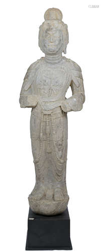 A large and impressive limestone carving of a standing Bodhisattva, Tang Dynasty