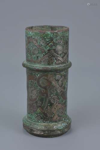 A Chinese Warring states silver-inlaid bronze chariot fitting