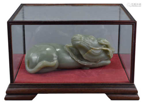 A Large Chinese Celadon Jade Carving of a Recumbent Water Buffalo