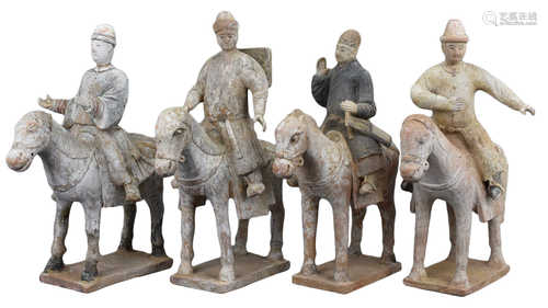 A Set of Four Chinese Ming Painted Pottery Horses with Riders