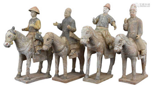 A Set of Four Chinese Ming Painted Pottery Horses with Riders