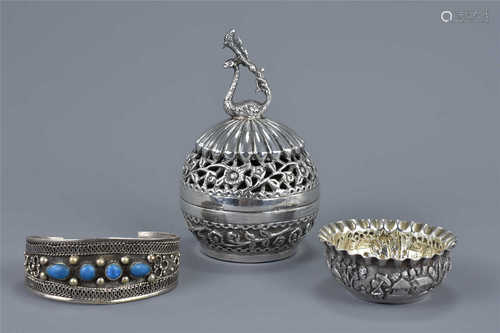 A fine white metal, possibly Indian, pot and cover with repousse with floral decoration