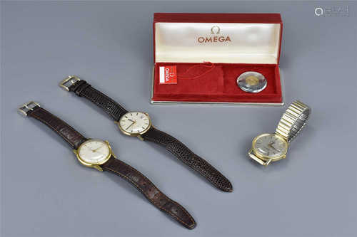 Three Omega wrist watches