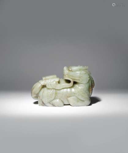 A LARGE CHINESE CELADON JADE CARVING OF A QILIN QING DYNASTY The mythical beast depicted in a