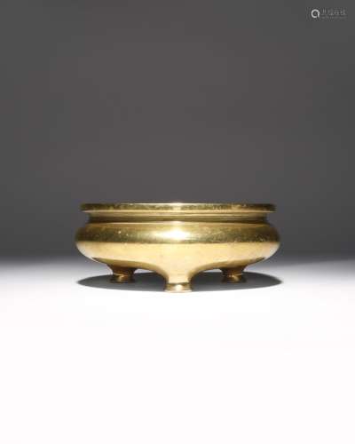 A CHINESE GILT-BRONZE TRIPOD INCENSE BURNER QING DYNASTY The compressed body surmounted by a short