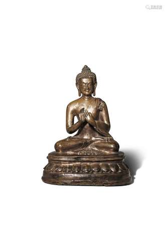 A CHINESE BRONZE FIGURE OF BUDDHA DIPANKARA 15TH CENTURY The figure seated in dhyanasana on a