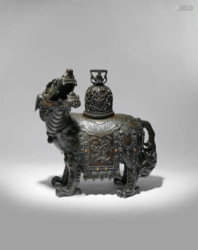 A LARGE CHINESE BRONZE 'MYTHICAL BEAST' INCENSE BURNER AND COVER QING DYNASTY Cast as a lion-like
