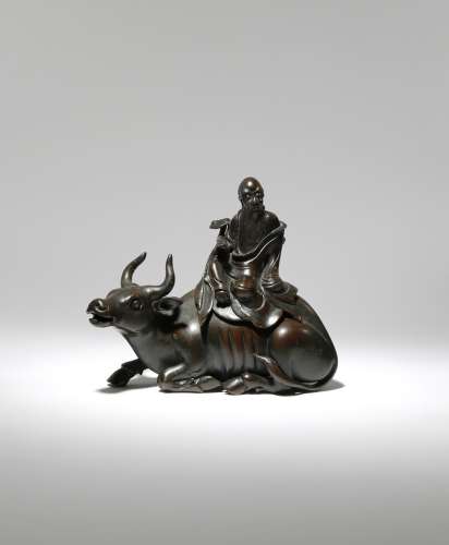 A CHINESE BRONZE 'LAOZI AND BUFFALO' INCENSE BURNER AND COVER 17TH CENTURY The cover formed as Laozi