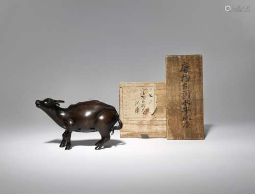 A CHINESE BRONZE 'WATER BUFFALO' WATER DROPPER 17TH CENTURY Formed as a standing water buffalo
