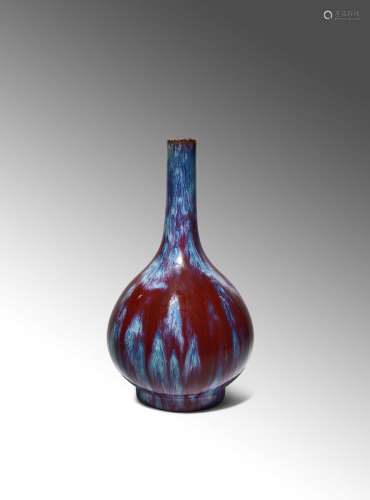 *A CHINESE IMPERIAL FLAMBE GLAZED BOTTLE VASE SIX CHARACTER QIANLONG MARK AND OF THE PERIOD 1736-