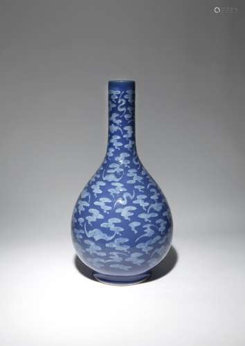 A CHINESE BLUE GLAZED 'HUNDRED BATS' BOTTLE VASE QIANLONG 1736-95 The pear-shaped body raised on a