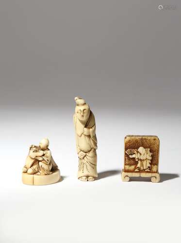 THREE JAPANESE NETSUKE EDO AND MEIJI PERIOD, 18TH AND 19TH CENTURY Two in ivory, one carved as a man