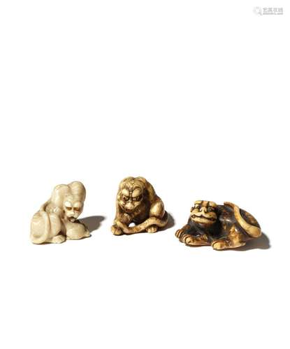 THREE JAPANESE IVORY NETSUKE OF TIGERS EDO PERIOD AND LATER, 18TH AND 19TH CENTURY One licking its