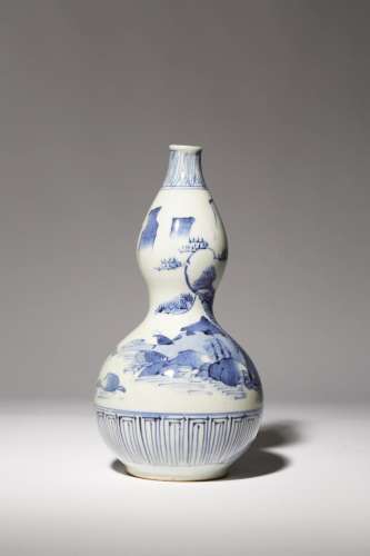 A JAPANESE ARITA BLUE AND WHITE SAKE BOTTLE, TOKKURI EDO PERIOD, 17TH CENTURY Shaped as a double